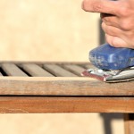sanding a chair iStock sanding a chair iStock